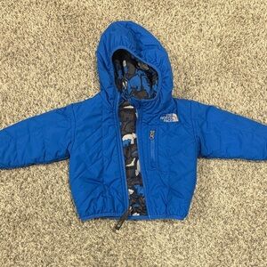 The North Face Vibrant Blue Jacket with Camo Lining